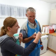 Linda and Alan looking at ring