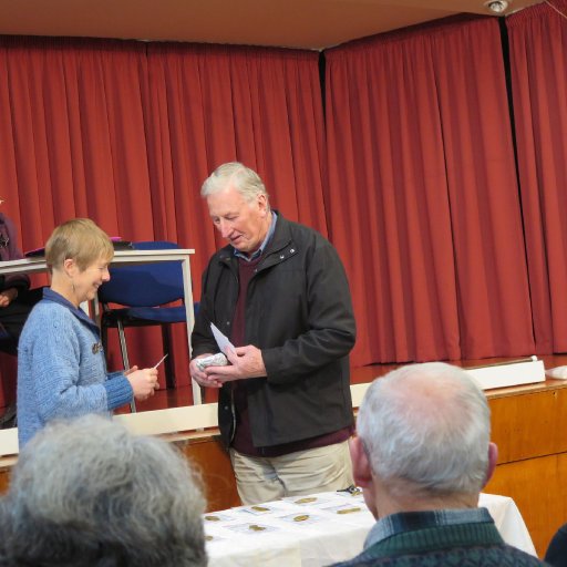 President awarding prizes